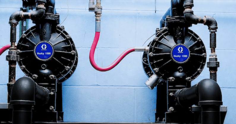 Two Graco Husky 1590 air-operated diaphragm pumps in service.