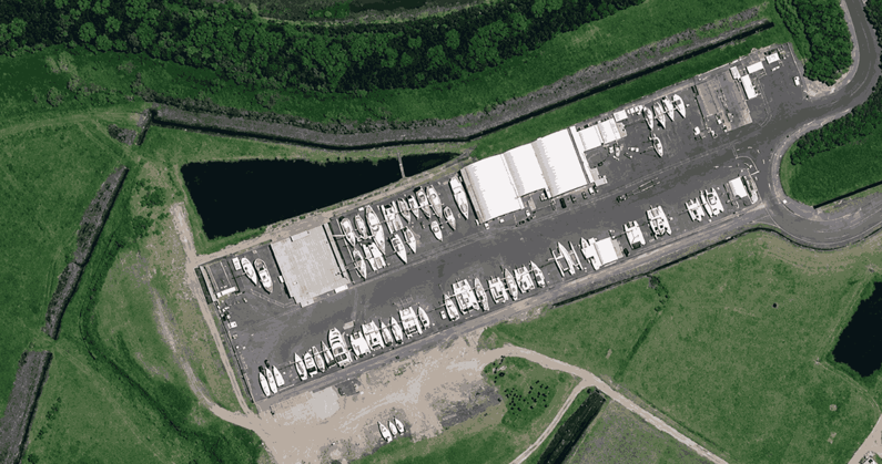 Aerial view of the Northport Boat Yard site – showing the storage pond needing treatment